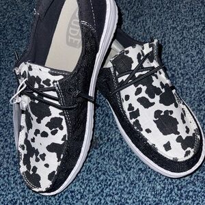 Hey Dude Black and White Cow Print Moccasins